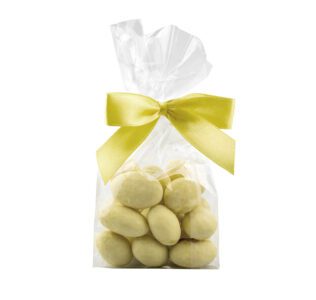 Migdały w czekoladzie białej naturalnie barwione na żółto w foliowej saszetce z kokardą