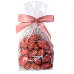 Migdaly w czekoladzie białej w pudrze z czarnej porzeczki liofilizowanej