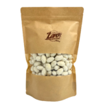 Migdaly w czekoladzie bialej o smaku kokosowym z wiorkami kokosa