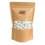 Migdaly w czekoladzie białej o smaku kokosowym z wiorkami kokosa