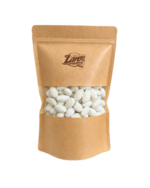 Migdaly w czekoladzie białej o smaku kokosowym z wiorkami kokosa